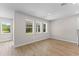 Open dining room with hardwood floors, recessed lighting, and views of the outdoors at 2650 Howard Ave, Oviedo, FL 32765
