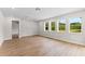 Spacious living room with hardwood floors, recessed lighting, and generous natural light at 2650 Howard Ave, Oviedo, FL 32765