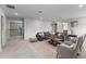 Cozy living room with comfortable seating, a stylish rug, and plenty of natural light at 2650 Howard Ave, Oviedo, FL 32765