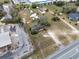 Overhead photo showcasing the property and its location, which includes neighboring businesses, storage and road access at 29650 State Road 19, Tavares, FL 32778