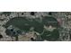 Aerial view of home on Lake Dora close to Downtown Mount Dora, Florida at 30215 Island Club Dr, Deer Island, FL 32778