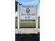 Welcome to Deer Island Golf sign with manicured landscaping at 30215 Island Club Dr, Deer Island, FL 32778