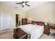 Comfortable bedroom featuring an ensuite bathroom at 3632 Solana Cir # B, Clermont, FL 34711