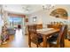 Open-concept living space with a view to a sunny patio, ideal for relaxation at 3632 Solana Cir # B, Clermont, FL 34711