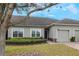 Beautiful single-story home with neatly trimmed landscaping and an attached garage at 3632 Solana Cir # B, Clermont, FL 34711