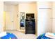 Cozy bedroom with twin beds, a closet and a mirrored dresser at 5352 Diplomat Ct # 107, Kissimmee, FL 34746