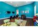 Fun game room with foosball table, television and game chairs at 5352 Diplomat Ct # 107, Kissimmee, FL 34746