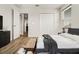 Nicely decorated room featuring a comfy bed with wood flooring, an open door, and lots of closet space at 580 Buchannan Dr, Davenport, FL 33837