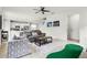 Inviting living room showcasing an open layout, seamlessly connecting to the modern kitchen at 580 Buchannan Dr, Davenport, FL 33837