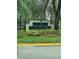 Community sign for Central Park, a Metrowest Condominium complex, with trees in the background at 6100 Westgate Dr # 203, Orlando, FL 32835