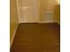 Empty room with wood floors and neutral walls at 6100 Westgate Dr # 203, Orlando, FL 32835
