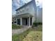 Well-maintained condo building with convenient storage and covered entryway at 6100 Westgate Dr # 203, Orlando, FL 32835