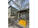 Exterior shot of community mailboxes with a yellow handicap-access ramp at 6100 Westgate Dr # 203, Orlando, FL 32835