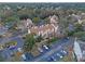Community aerial view showcases the landscape, parking, and building exterior at 625 Greencove Ter # 130, Altamonte Springs, FL 32714