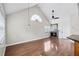 Comfortable living room with high ceilings, laminate flooring, and a charming fireplace at 625 Greencove Ter # 130, Altamonte Springs, FL 32714