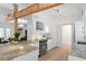 Bright kitchen featuring stainless steel appliances, stylish countertops, and a convenient breakfast bar at 625 Worthington Dr, Winter Park, FL 32789