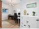 Home office area featuring a desk, monitor, and bright natural light from the window at 625 Worthington Dr, Winter Park, FL 32789