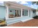Cozy patio area with comfortable seating and a charming outdoor setting at 625 Worthington Dr, Winter Park, FL 32789