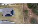 Aerial view of home's roof, backyard and property line at 663 Fairview Ave, Haines City, FL 33844