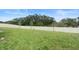 Large, well-maintained backyard with a privacy fence, offering ample space for recreation and relaxation at 663 Fairview Ave, Haines City, FL 33844