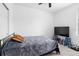Bedroom featuring a ceiling fan, TV, and stool seats at 663 Fairview Ave, Haines City, FL 33844