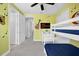 Bright and colorful bedroom with a white bunk bed and music-themed decor at 7419 Marker Ave, Kissimmee, FL 34747