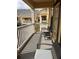 Comfortable outdoor seating on a shaded patio with a neighborhood view at 860 N Orange Ave # 470, Orlando, FL 32801