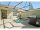 Private pool with a screened enclosure, perfect for outdoor entertaining and relaxation, plus a BBQ grill at 8990 Cuban Palm Rd, Kissimmee, FL 34747