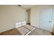 Bedroom with neutral carpet, white walls, and a closet door at 1003 Cascade Dr, Davenport, FL 33837