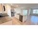 Kitchen features granite countertops, stainless steel appliances and an island with a sink at 1003 Cascade Dr, Davenport, FL 33837
