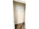 A walk-in closet with multiple shelves provides storage for clothing and accessories at 1003 Cascade Dr, Davenport, FL 33837