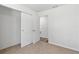 Bedroom with carpeted floors, closet, and white walls, offering a blank canvas for personalization at 102 Sail Way, Kissimmee, FL 34759