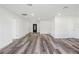 Bright and airy open-concept space featuring modern flooring and plenty of natural light at 102 Sail Way, Kissimmee, FL 34759