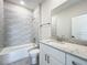 Bathroom showcases modern tile work and a vanity with a marble countertop at 1112 W Line St, Leesburg, FL 34748