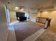 Large bedroom with a ceiling fan, sliding glass doors, and a view of the lower level, offering comfort and privacy at 11290 Se 189Th Ct, Ocklawaha, FL 32179