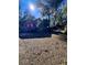A home's wooded lot and covered parking contribute to a serene country setting at 11290 Se 189Th Ct, Ocklawaha, FL 32179