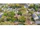 Aerial view of an upscale residential area showcasing lush trees and many residences at 1141 S Osceola Ave, Orlando, FL 32806