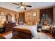 Warm bedroom with natural light, traditional furnishings, and decorative accents for cozy elegance at 1141 S Osceola Ave, Orlando, FL 32806