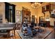 Cozy living room with a large bookshelf, piano and high ceiling at 1141 S Osceola Ave, Orlando, FL 32806