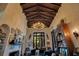 High ceiling Living room with chandelier, fireplace, bookshelf and piano at 1141 S Osceola Ave, Orlando, FL 32806