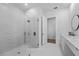 Elegant bathroom featuring glass shower, modern fixtures, and bright, neutral tones for a spa-like experience at 15843 Vetta Dr, Bella Collina, FL 34756