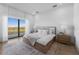 Spacious bedroom with a large window and natural light creates a serene and inviting atmosphere at 15843 Vetta Dr, Bella Collina, FL 34756