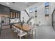 Open-concept living room and kitchen with modern design, high ceilings, and abundant natural light at 15843 Vetta Dr, Bella Collina, FL 34756