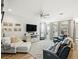 Spacious living room with ceiling fan, lots of natural light and comfortable seating at 16310 Rock Coast Dr, Winter Garden, FL 34787