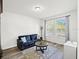 Comfortable sitting room with natural light, modern furnishings, and neutral decor at 16310 Rock Coast Dr, Winter Garden, FL 34787