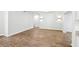 Spacious living room with modern flooring, recessed lighting and light paint at 1834 Willie Mays Pkwy, Orlando, FL 32811