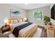 Cozy main bedroom with a large window and modern decor at 1834 Willie Mays Pkwy, Orlando, FL 32811