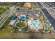 Enjoy this neighborhood's resort-style amenities, including a splashpad, pool, water slides, and open green spaces at 187 Aces High Ln, Davenport, FL 33896