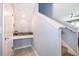 Hallway featuring modern desk area, tile flooring, and natural light at 187 Aces High Ln, Davenport, FL 33896