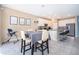 Open concept kitchen and breakfast nook with stainless steel appliances and tile flooring at 187 Aces High Ln, Davenport, FL 33896